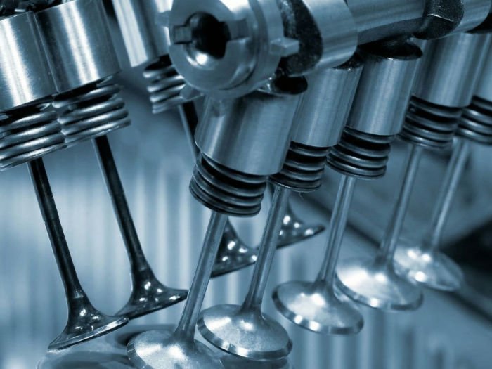 Valvetrain of a multi-cylinder engine showing valves, springs and tappets